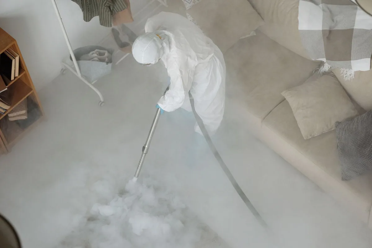 Biohazard cleanup technician in protective equipment, Lincroft, NJ